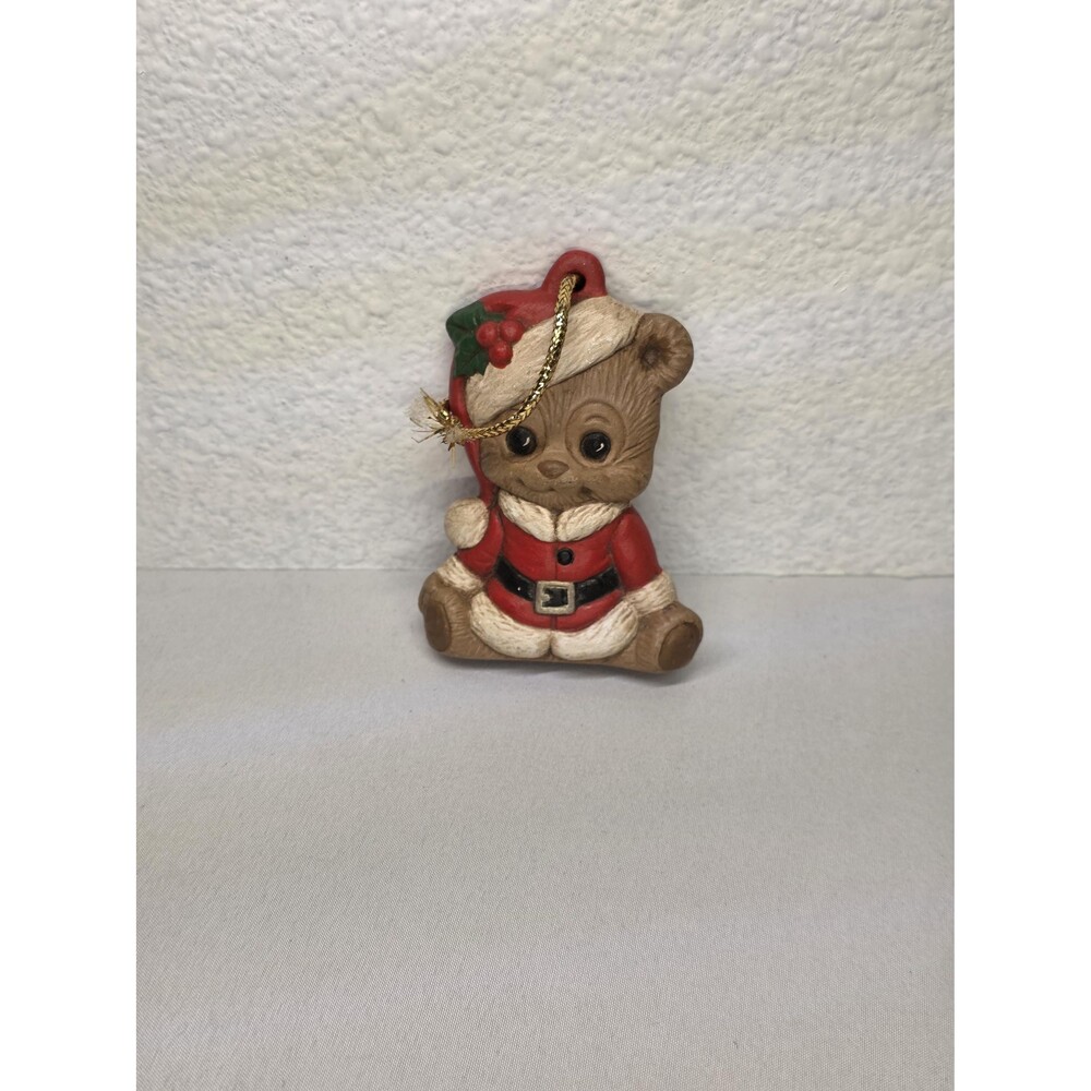 Collectible Vintage teddy bear wearing a Santa suit ceramic Christmas ornament